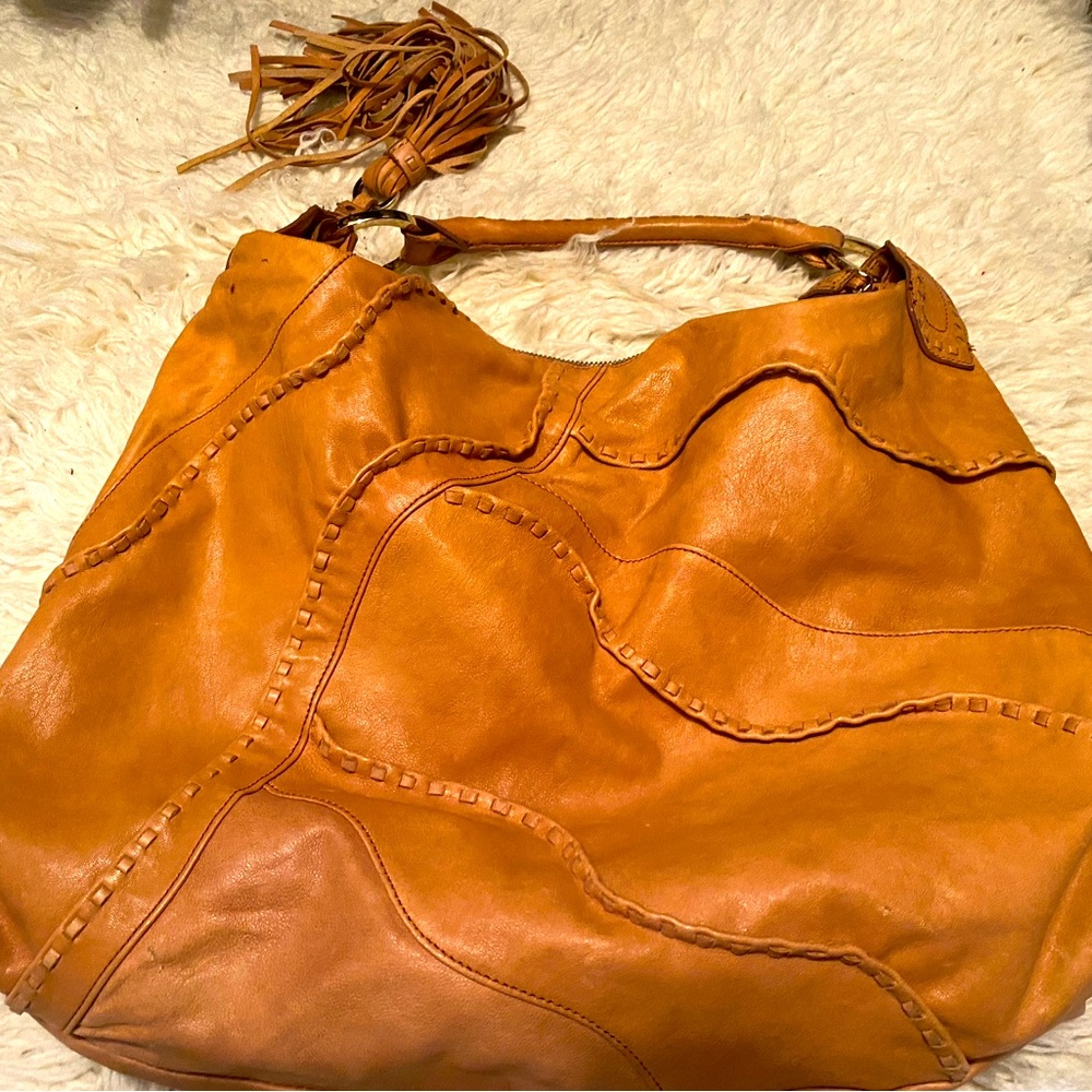 Hobo bag with tassel burnt tan colour, barely used